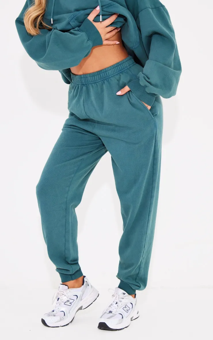 Jogging retroussé bleu-vert délavé oversize